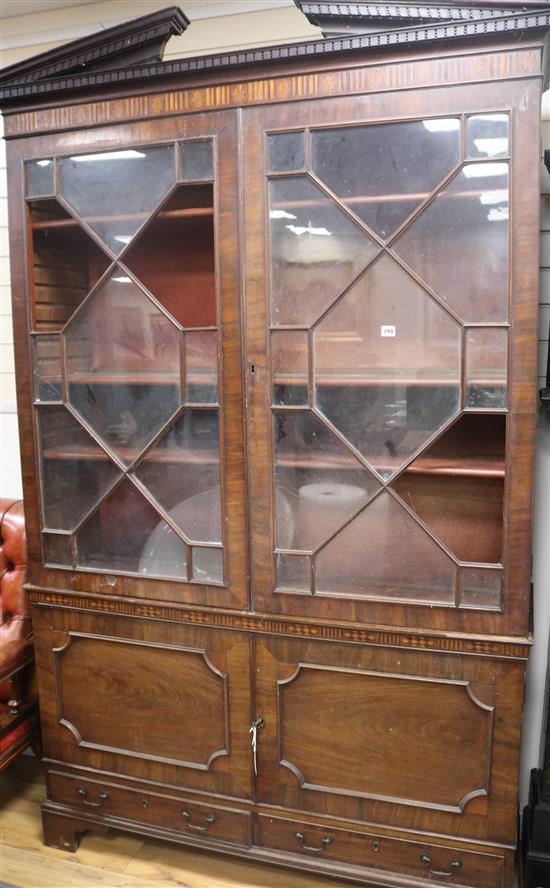 A George III inlaid mahogany bookcase cupboard, H.230cm